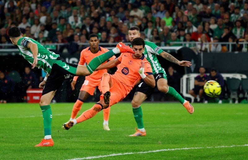 Soccer-Torres bags hat-trick as Barcelona batter Betis 5-3