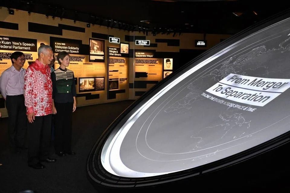 SM Lee Hsien Loong (centre) and Minister for Digital Development and Information Josephine Teo (right) at the launch of The Albatross File: Inside Separation book and exhibition on Dec 7. --ST PHOTO: CHONG JUN LIANG