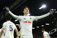 Soccer-Tanaka the talisman as Leeds roar back to draw with Liverpool