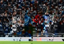 Soccer-Manchester City narrow gap in table with dominant win over Sunderland