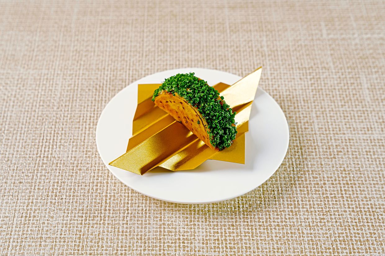 The Chettinad chicken roti celebrates a childhood staple and turns it into a refined snack.