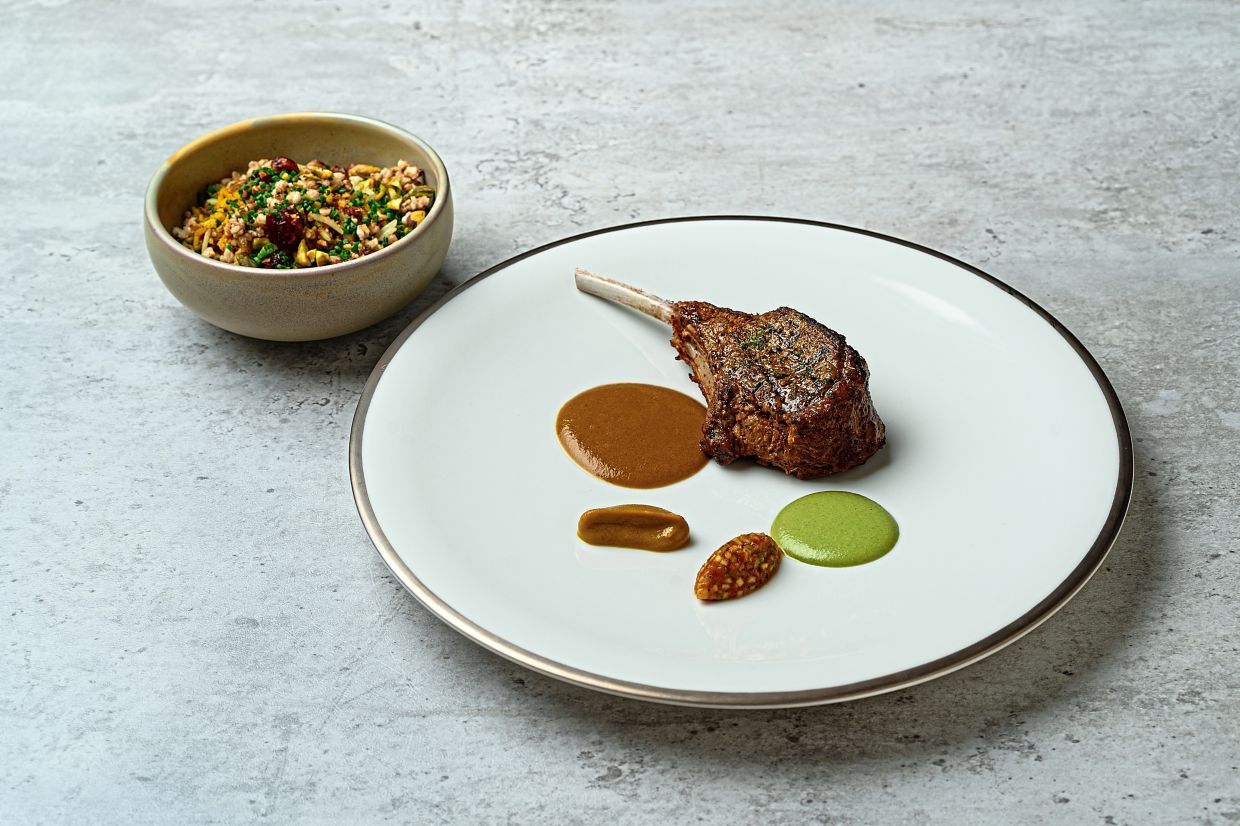 The Mysore lamb with biryani is a modern take on the traditional banana leaf rice.