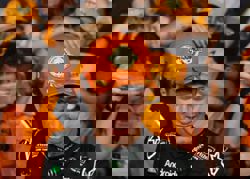 Motor racing-I did it my way, says emotional champion Norris