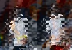 Soccer-Jeonbuk confirm departure of title-winning coach Poyet