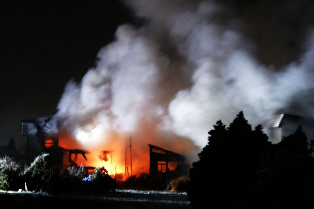 A general view showing the scene of a fire that broke out after an earthquake in Aomori City on Dec 9, 2025. - AFP