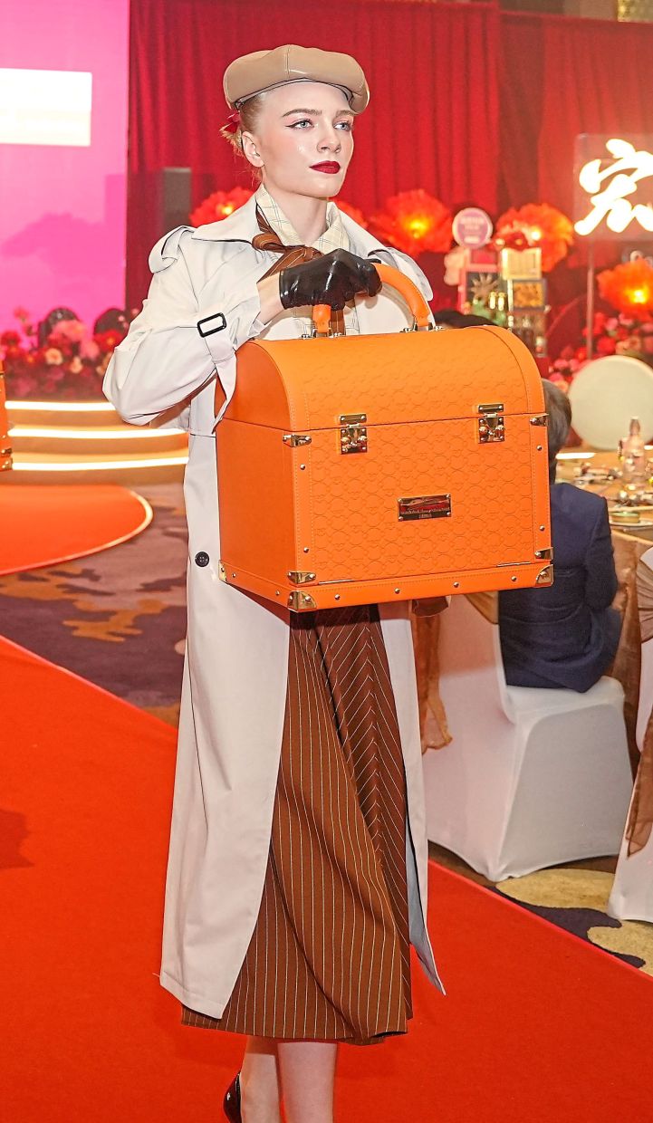 The bag Jimmy Choo designed draws from tradition and heritage, but he tells his story in the details. Photo: Eu Yan Sang