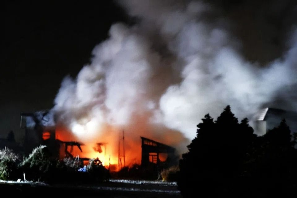 A fire broke out at a house after an earthquake in Aomori, north-eastern Japan, on Dec 9. -- PHOTO: AFP