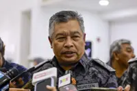 M’sian, foreigner held over fake passport, overstaying