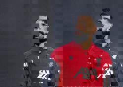 Soccer-Salah left out of Liverpool squad for Inter trip after criticising club