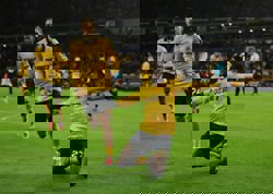 Soccer-Manchester United go sixth with 4-1 win as Wolves' misery continues