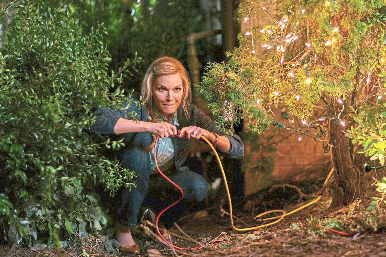 Pfeiffer plays put-upon mum in new Christmas film Oh. What. Fun. — Handout