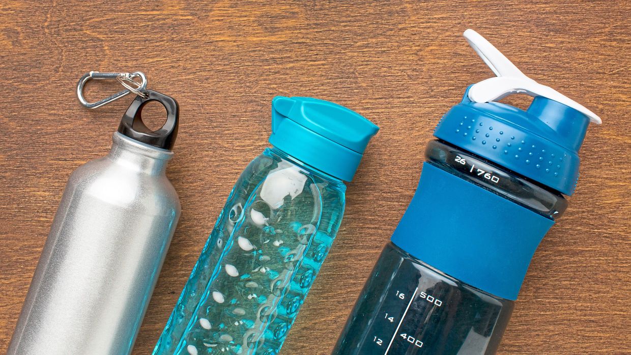 Water bottle cleaning routines may not all look the same, but it’s important to keep up the habit. — Freepik