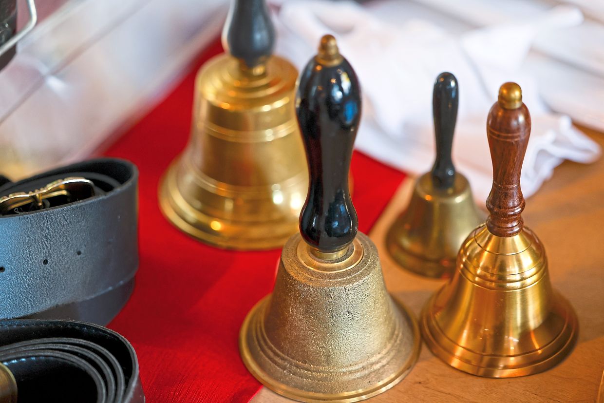 Bells stand on a table in the training room.