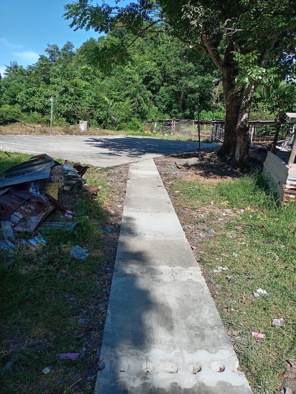 The pathway leading to the volleyball court