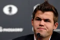 Chess-Carlsen claims Freestyle Grand Slam title