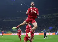 Soccer-Late Szoboszlai penalty gives Salah-less Liverpool 1-0 win over Inter