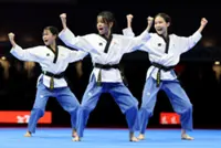 Taekwondo girls bring cheer with gold in poomsae event