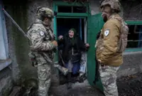 As Russians get closer, some Ukrainians refuse to leave