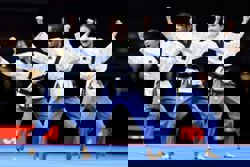 Taekwondo girls bring cheer with gold in poomsae event