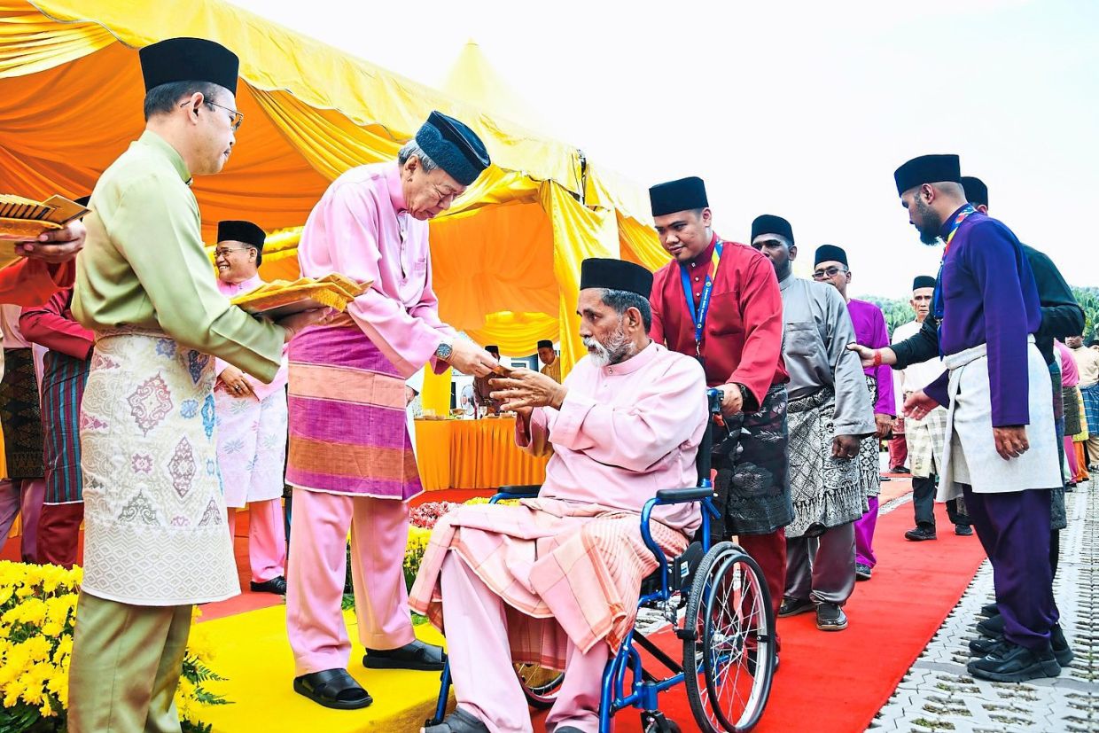 Following the launch of the Bandar Teknologi Kajang Mosque in Semenyih in March, Sultan Sharafuddin presented contributions to the underprivileged. — Photo from Selangor Royal Office Facebook page