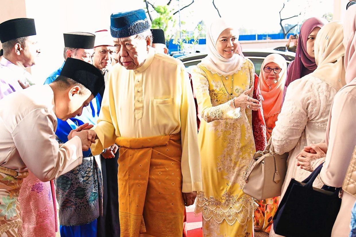 The royal couple greeting people at the Tengku Ampuan Jemaah Mosque in Shah Alam on the first day of Hari Raya Aidilfitri in March. — Photo from Selangor Royal Office Facebook page