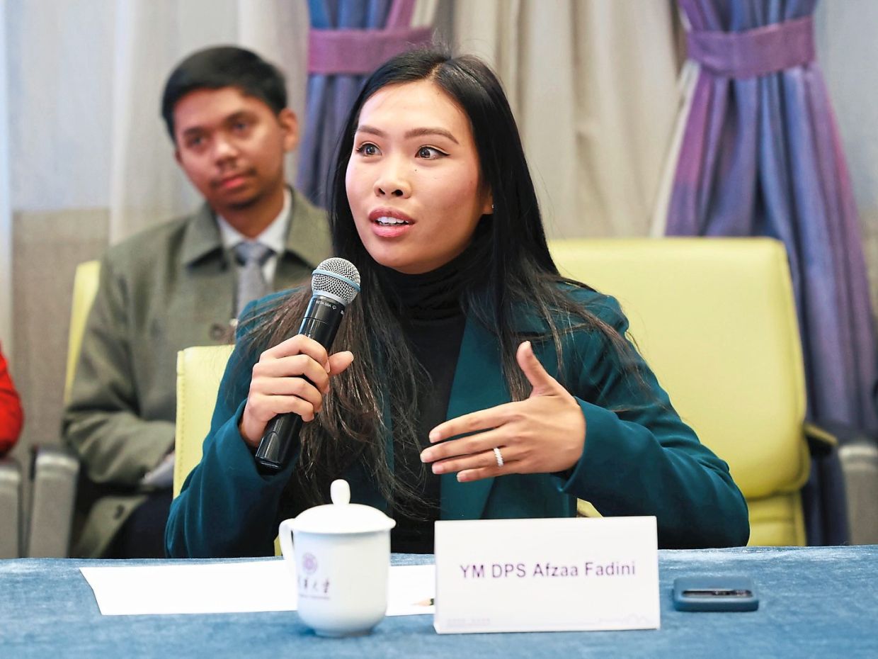 Afzaa Fadini addressing the audience during an event at Tsinghua University in the same month. — Photos from the Selangor Royal Office Facebook page