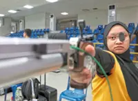 No love lost at the range for pistol shooter Dina