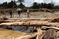 Indonesia suspends four firms suspected of contributing to deadly North Sumatra flooding