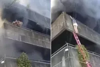 Filipino fur-mum hailed as a hero after tossing pet dogs to safety in fiery third-floor rescue