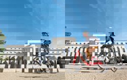 Divided Fed lowers rates, signals pause and one 2026 cut as growth rebounds