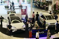 INTERACTIVE: EV buyers race to beat deadline