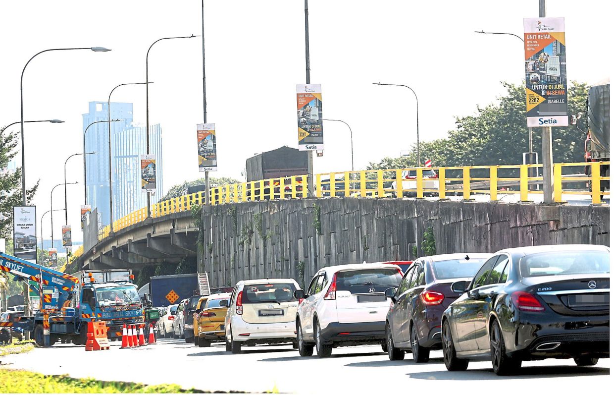 Flyovers shift, but do not resolve, traffic congestion. — Filepic