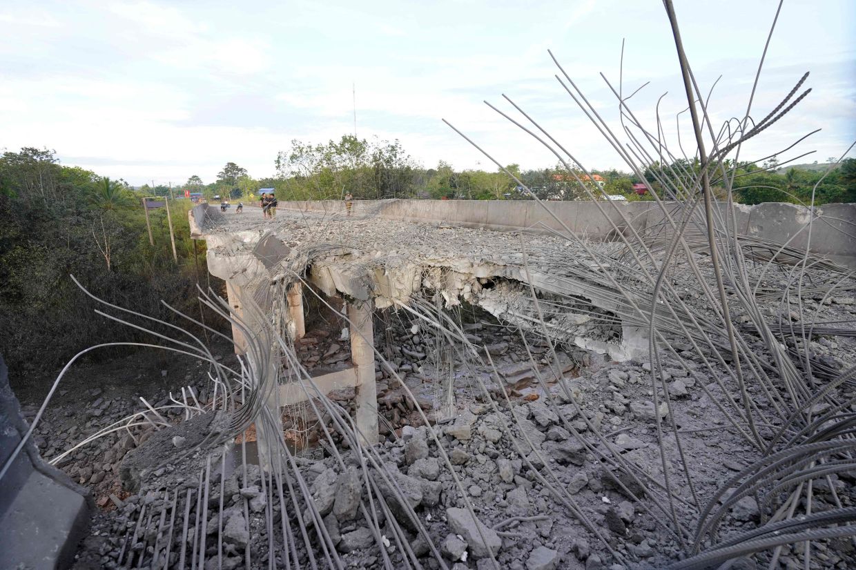 Cambodia says Thailand still bombing hours after Trump truce call