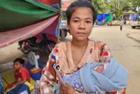 ‘Bullets were flying over my roof’: Mothers in Cambodia flee to shelters to protect their kids
