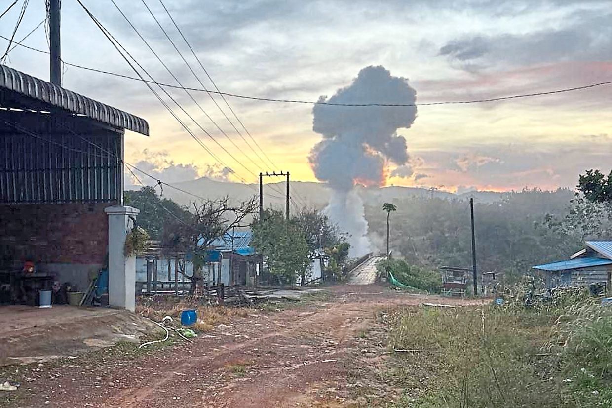 Danger from above: Smoke rising following a blast in Pursat province, Cambodia, amid clashes along the Cambodia-Thailand border. — Agence Kampuchea Press/AFP