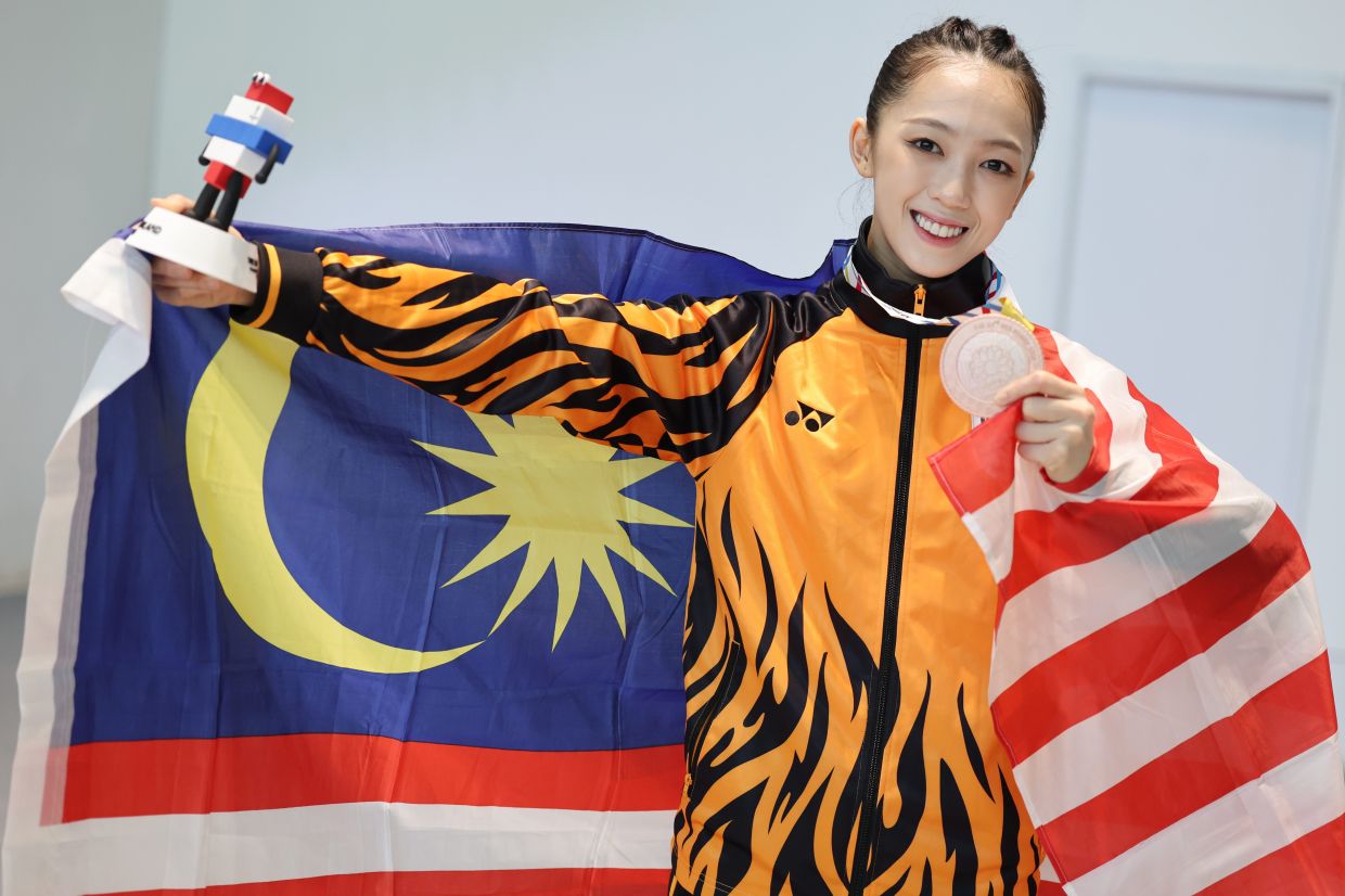 Wushu star Sydney says goodbye with gold and bronze