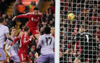 Soccer-Liverpool's Ekitike scores twice, Salah gets warm reception in win over Brighton