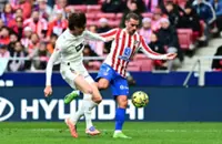 Soccer-Atletico substitute Griezmann secures 2-1 win over Valencia