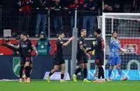 Soccer-Terrier's backheel magic helps Leverkusen to 2-0 win over Cologne