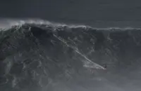 Surfing-Dupont, Chianca claim big wave titles in giant Nazare surf