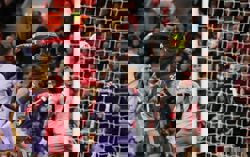 Soccer-Liverpool's Ekitike scores twice, Salah gets warm reception in win over Brighton