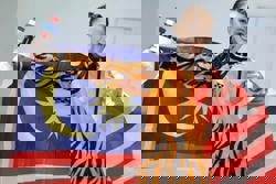 Wushu star Sydney says goodbye with gold and bronze