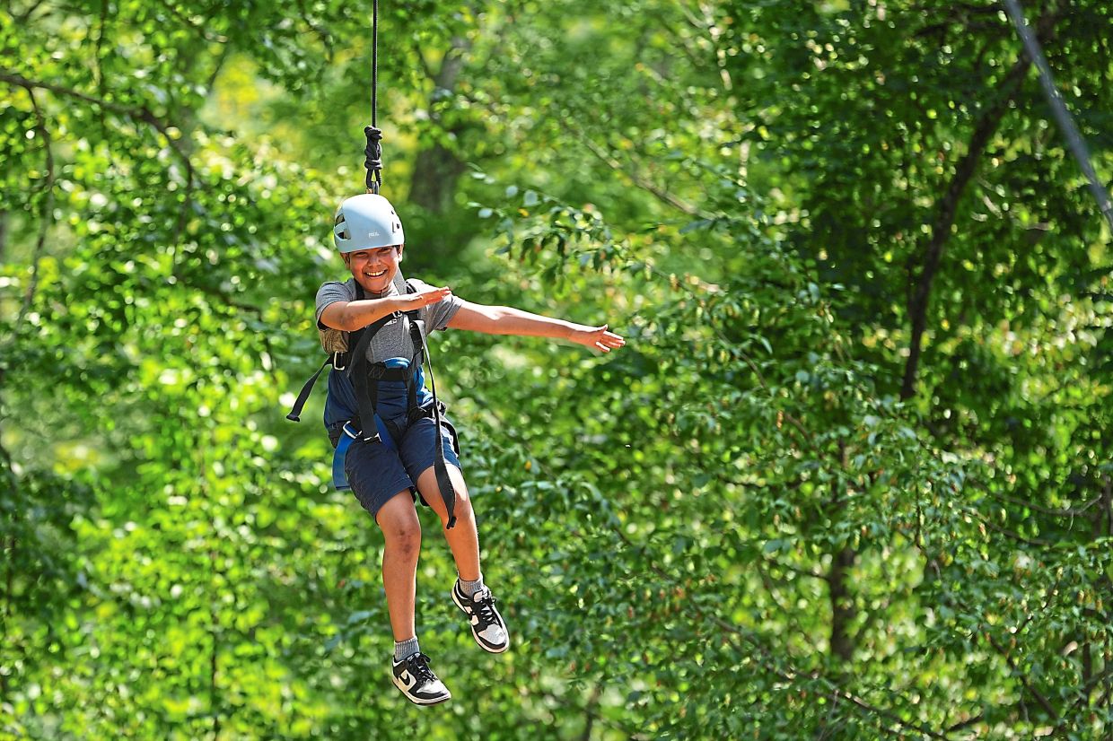 The paediatric lupus patient on a high-ropes course at the camp. Photo: AP