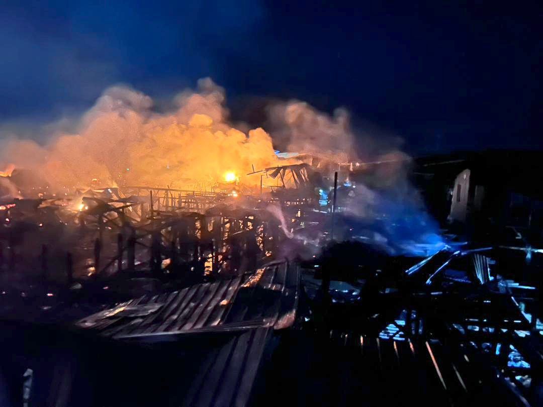 Devastation: The intense flames swept across 30 stilt houses in Kampung Sri Aman.