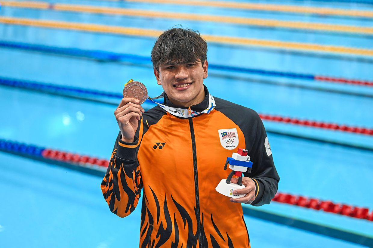 Arvin gets a medal for his birthday