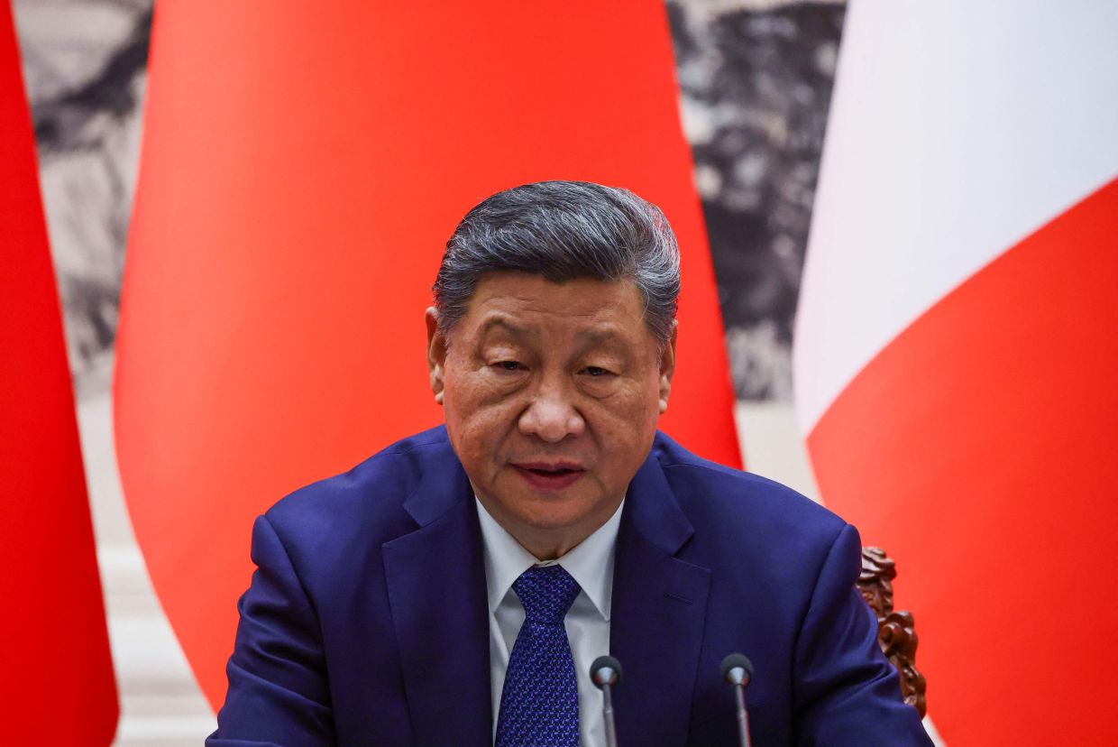 China's Xi warns officials against chasing 'reckless' GDP