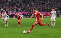 Soccer-Bayern need late Kane penalty to rescue 2-2 home draw against strugglers Mainz