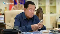 Hun Sen says land crossings in Cambodia are closed, tells Thais to fly home instead