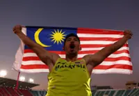 Andre strikes gold with final-jump surge