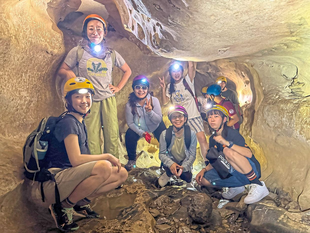 Inside one of the narrower passages of Gua Ikan, where a torchlight is essential.